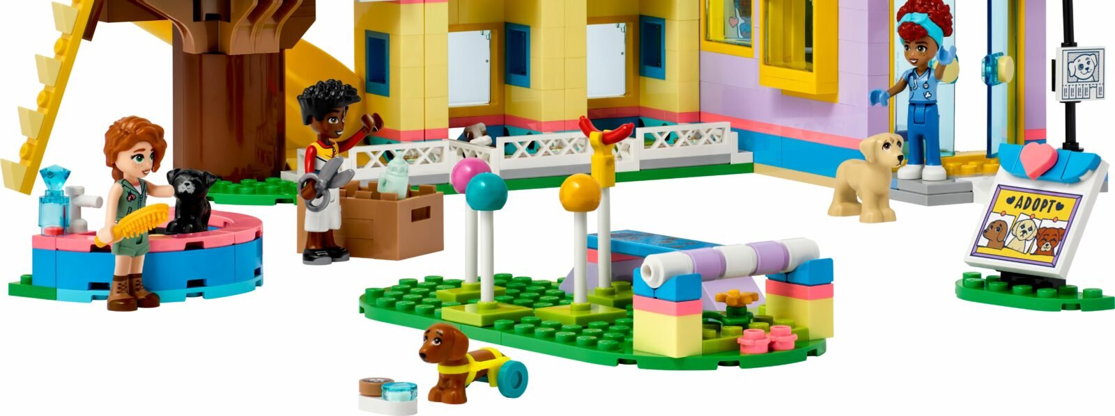 Ansicht eines LEGO-Friend Hauses mit verschiedenen Figuren und Lego hunden